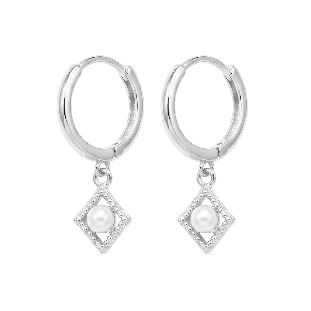 Sterling Silver Huggie Earrings With Pearl Charm