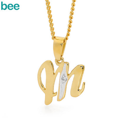 9ct yellow gold diamond set 'M' initial pendant and plated chain